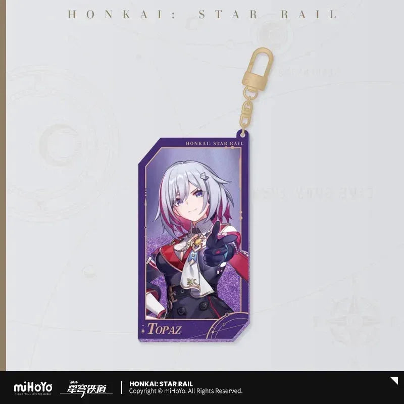 Honkai: Star Rail Invitation From The Stellar Series Glitter Quicksand Acrylic Keychain Topaz ACG Go Anime www.acg-go.com Acheron, Aglaea, Argenti, Art Decor, Aventurine, Bailu, Black Swan, Blade, Boothill, Dan Heng • Imbibitor Lunae, Dr. Ratio, Feixiao, Firefly, Fu Xuan, Fugue, Huohuo, Jade, Jiaoqiu, Jing Yuan, Jingliu, Kafka, Lingsha, Luocha, March 7th, Mydei, Rappa, Robin, Ruan Mei, Seele, Serval, Silver Wolf, Sparkle, Stand, Sunday, The Herta, Topaz, Tribbie, Yunli